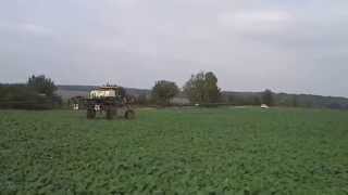 Challenger Spra Coupe spraying rapeseed seeded by Monosem Twin Row