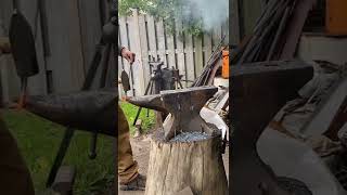 Forging a drawer pull.