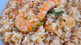 Comendo risotto de camarão em Caiscais Portugal