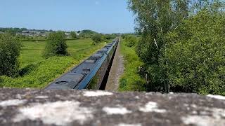 80X xxx and 80X xxx of GWR pass under exminster overpass 27/5/23