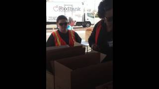 Volunteers packing boxes