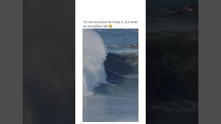 Bro surfing thru a tsunami