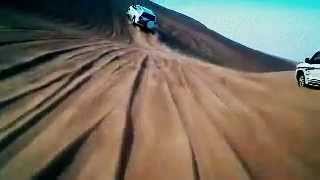 Dune buggying in Dubai desert.