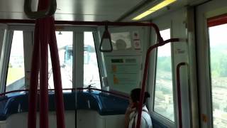 Mitsubishi Crystal Mover [36] opening doors at Cheng Lim LRT station