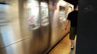 145 Street bound M train arriving into Broadway Laffayette Street