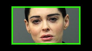 Rose mcgowan hands herself in to police