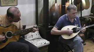 Nikos Strouthopoulos plays bouzouki made by Tasos.