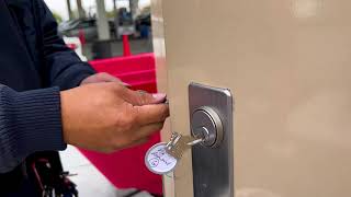 ASI Technician Installing the Rekeyed Lock