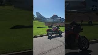 Top Gun Motorcycle On Display In Front Of An A4 Skyhawk