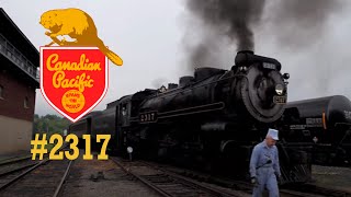 Steamtown in Scranton, PA: Canadian Pacific #2317 steam locomotive and train heads east at Bridge 60