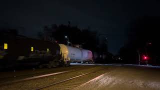 CSX 3041 ES44AH leads CSX M403 with a Clean ES40DC trailing at Piscataway