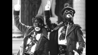 Wheeler and Woolsey in Blackface singing No More War