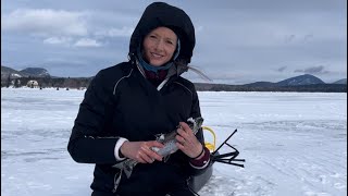 Ice fishing for salmon Moosehead Lake Maine