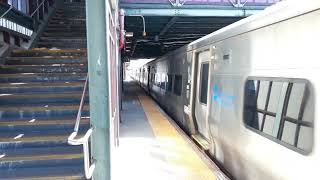 Babylon Branch train to Penn station arriving into Woodside