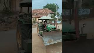 John deere tractor riding by kid and his father  #shot's