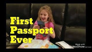 an excited 6 year old gets suprise with her first passport ever.