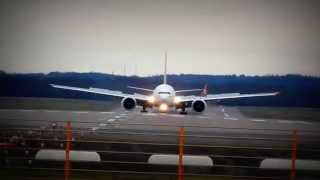 Emirates Boeing 777-300ER landing at Düsseldorf Airport