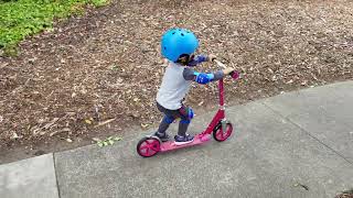 Fearless 3-year-old conquers the pink razor scooter with ease