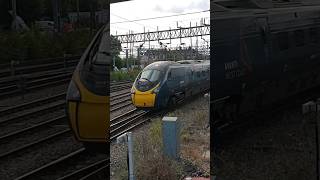 Class 390 departs Crewe