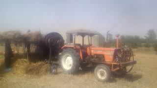 Nh Algazi 65 HP working on wheat tharshar