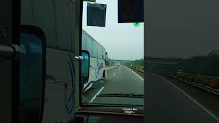 Mitsubishi Rosa Fuso Small Bus Overtaking An Ashok Leyland Luxury Bus At Expressway