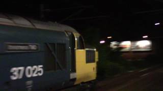 37025 "Inverness TMD" and 37421 TnT on 1Q26 passing Saltcoats.