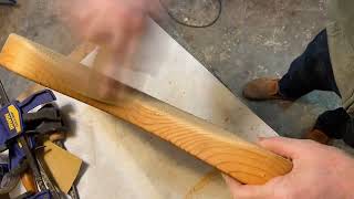 Carving a belly scarf on a guitar by hand