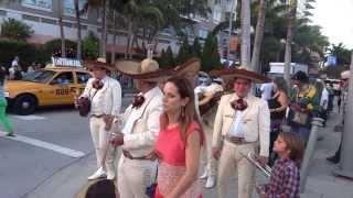 Mercadito's Mariachi's serenade NE 1st ave during Art Basel 2013