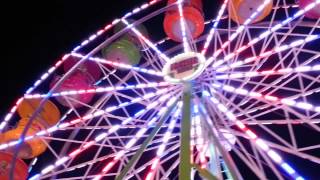 My baby girl on rides at a carnival