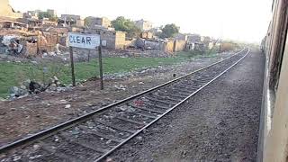 Pakistan Railway Millat Express with Chinese Engine running near to Hyderabad