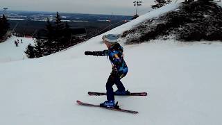 Snowboarder stealing skier's poles