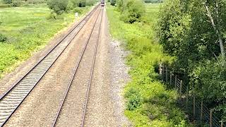 1502xx of GWR and 45596 "Bahamas" pass exminster overpass