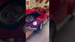 R$ 259,00Miniatura Fusca Escala 1/18 com Som, Luz e Buzina - 22,5cm de Compriment