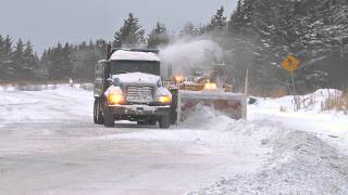 snow plow daytime clearing road