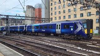 Class 385 departs Glasgow Central