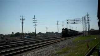 HD: CSX Ex-Conrail C40-8 7489 leads CP 633 meeting CP's Southside local. Franklin Park Il.