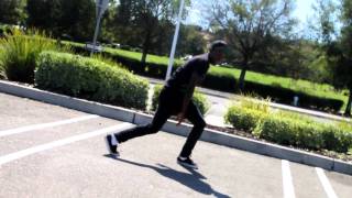 Guy dancing in parking lot