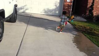 Liam playing baseball with dad