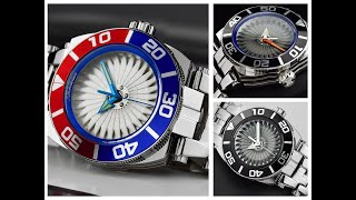 Millipede Automatic in 43mm and 48mm, charcoal, blue and silver. Debuts on Feb 25th 12pm EST