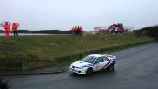 Mark Roberts in a Ford Escort Cosworth followed by Mark Bentley in a Subaru Impreza