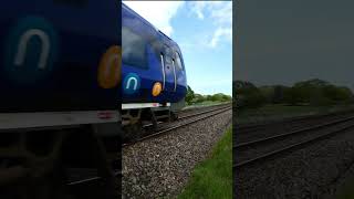 195131 accelerates away from Gregson Lane level crossing