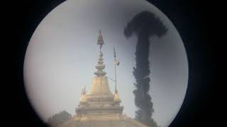 Monkey climbing down from top of pashupatinath temple.