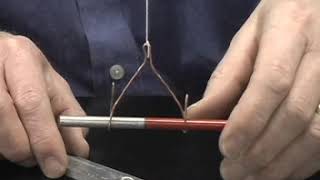 Suspended Magnet: Attraction and Repulsion