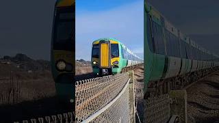 Class 377 passes Tide Mills