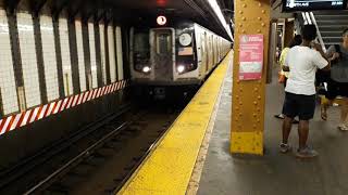 8 Avenue bound L train arriving into 6 Av-14 Street