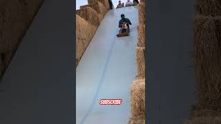 My Dad & aMy Brother in the Giant Hay Bale Slide.