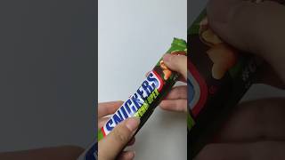 unpacking ASMR chocolate Snickers hazelnut 🍫😍 #asmr #asmrsweets #asmrsnickers #snickersfixtheworld