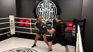 Angelina Semenova kicking pads Varyag Gym