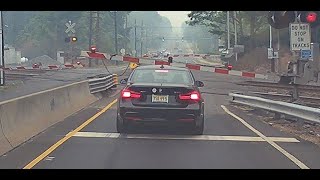 Railroad Crossing Arm Lowers on Car