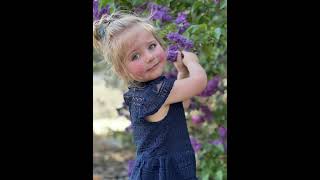 Kennedy picking flowers